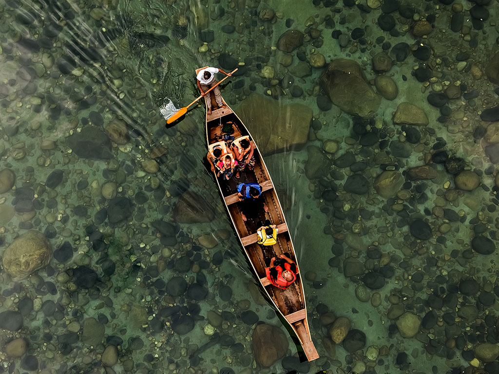 This viral pic of a boat floating on a clear river is from Meghalaya. Save it for your next getaway